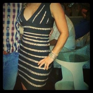 Women's black plunge dress with diamond accents